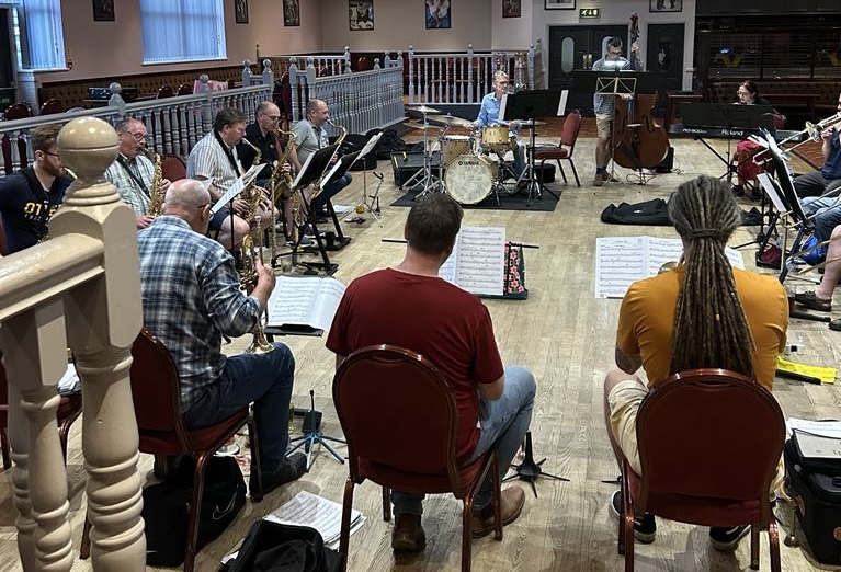 Photo of The Badgers Big Band rehearsing July 2025.